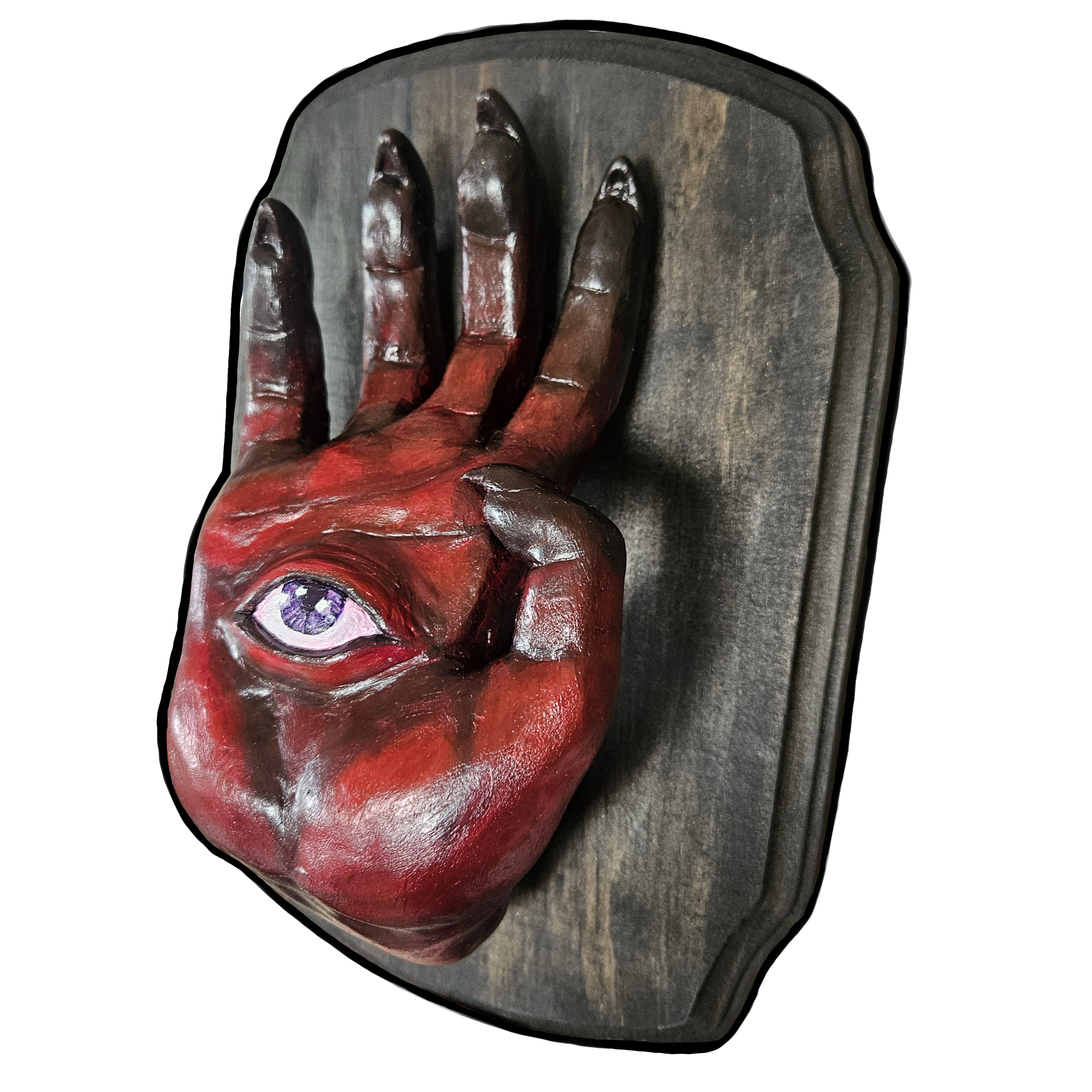  dark red demon hand sculpture with a purple eye on the palm
